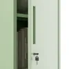 A close-up view of a light green metal cabinet with a key lock. Podgląd zdjęcia produktu