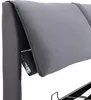 A close-up view of the upholstered headboard of a bed, showing the mechanism for adjusting its angle. Produktbild-Vorschau