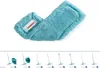 A close-up of a turquoise mop head with a white label. Produktbild-Vorschau