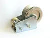 A metal winch with a cable and gear is shown against a white background. Produktbild-Vorschau