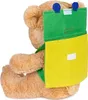 A side view of a plush teddy bear wearing a green and yellow backpack. Produktbild-Vorschau