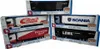 A collection of toy trucks in their packaging. Produktbild-Vorschau