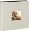 A photo album with a small inset picture of a girl wearing a hat. Podgląd zdjęcia produktu