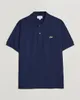 A navy blue Lacoste polo shirt for men is displayed flat against a light gray background. Produktbild-Vorschau