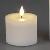 A close-up of a white LED candle with a flame. Produktbild-Vorschau