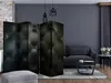A modern living room with a tufted room divider, sofa, and coffee table. Produktbild-Vorschau