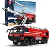A remote-controlled fire truck model and its packaging are displayed. Voir les images du produit