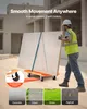A construction worker is moving a large white panel on an orange cart with wheels. Podgląd zdjęcia produktu