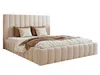 A beige upholstered bed with pillows and a throw blanket, presented on a white background. Náhled obrázku produktu