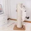 A cat is playing on a scratching post in a room. Produktbild-Vorschau