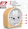 The back of a wooden alarm clock with labels and indicators. Produktbild-Vorschau
