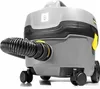 A close-up, studio shot of a gray and black vacuum cleaner with a black hose attached, set against a white background. Náhled obrázku produktu
