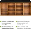 A shoe rack with a black cushion on top, with text describing its features in English and German. Náhled obrázku produktu