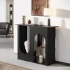 A modern living room with a black console table, lamp, and decorative items. Produktbild-Vorschau