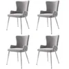 Four gray velvet dining chairs with silver metal legs are arranged in a 2x2 grid against a white background. Produktbild-Vorschau