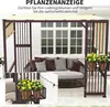 A pergola pavilion with outdoor furniture and plants, set against a white brick wall and windows. Anteprima dell’immagine prodotto