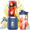 A blue portable smoothie maker filled with fruit, next to a glass of smoothie and surrounded by fruit and ice cubes, with yellow splashes in the background. Voir les images du produit
