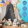A baby is playing with teddy bears under a canopy in a nursery decorated with balloons and stars. Produktbild-Vorschau