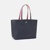 A dark blue tote bag with red handles is shown against a light gray background. Anteprima dell’immagine prodotto