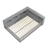 A 3D rendering of a gray bed frame with a slatted mattress base and built-in shelving. Produktbild-Vorschau