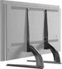 The back of a television with two black metal TV stand legs attached. Anteprima dell’immagine prodotto