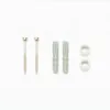 A set of hardware components, including screws, wall plugs, and washers, laid out on a white background. Podgląd zdjęcia produktu