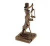 A statue of Lady Justice on a white background. Produktbild-Vorschau