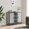 A sideboard is placed in a room with a plant and a picture on the wall. Produktbild-Vorschau