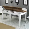 A dining table with its top open, revealing storage compartments. The table is in a room with modern decor, including framed pictures and pendant lights. Anteprima dell’immagine prodotto