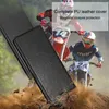 Two motocross riders in action with a black flip case in the foreground. Náhled obrázku produktu
