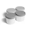 Four white ice cream containers with gray lids are arranged in a group on a white background. Produktbild-Vorschau