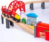 A wooden toy train set with a bridge, station, and tunnel. Produktbild-Vorschau