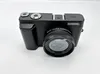 A black digital camera is shown against a white background. Náhľad obrázku produktu