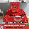 A Christmas-themed duvet cover set with a reindeer design is displayed on a bed. Produktbild-Vorschau