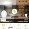 A split image showing a modern kitchen with two different lighting options: a bright LED ceiling light on the left and traditional incandescent pendant lights on the right. Produktbild-Vorschau