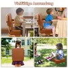 Collage of four images showing a toddler booster seat in various settings: a child at a table, a child being fed, a child holding the seat, and two children sitting on the grass with the seat. Produktbild-Vorschau