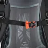 A close-up view of a backpack's chest strap with an orange buckle and a mesh back panel with airflow graphics. Náhled obrázku produktu