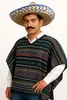 A man wearing a poncho and a sombrero. Produktbild-Vorschau