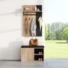 A hallway furniture set with a wall-mounted coat rack and a shoe bench, set against a white wall and a view of a green lawn and trees. Produktbild-Vorschau
