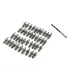 A collection of metal spikes and a drill bit on a white background. Produktbild-Vorschau
