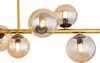 A close-up view of a modern chandelier with multiple glass globes. Náhled obrázku produktu