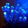 A close-up view of a string of blue LED lights. Produktbild-Vorschau