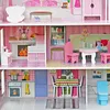 A multi-story dollhouse with furniture. Produktbild-Vorschau