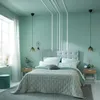 A bedroom scene with a bed, nightstands, and decorative elements. Produktbild-Vorschau