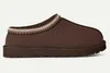 A single brown UGG Tasman II slipper is shown in profile against a light gray background. Anteprima dell’immagine prodotto