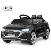 A black Audi SQ8 ride-on car for children, shown from the front with its headlights on. A white remote control is visible in the top left corner. Produktbild-Vorschau