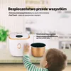 A baby's hand reaches for a rice cooker and its inner pot. Text highlights safety features. Podgląd zdjęcia produktu