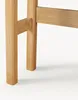 Close-up view of the wooden legs and support beams of a piece of furniture. Produktbild-Vorschau