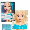 A collage of images showing a Disney Princess Elsa styling head toy, its packaging, and a close-up of the styling head. Voir les images du produit