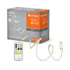 The image shows the packaging of an LED light strip product, with the product itself and a remote control also visible. Anteprima dell’immagine prodotto